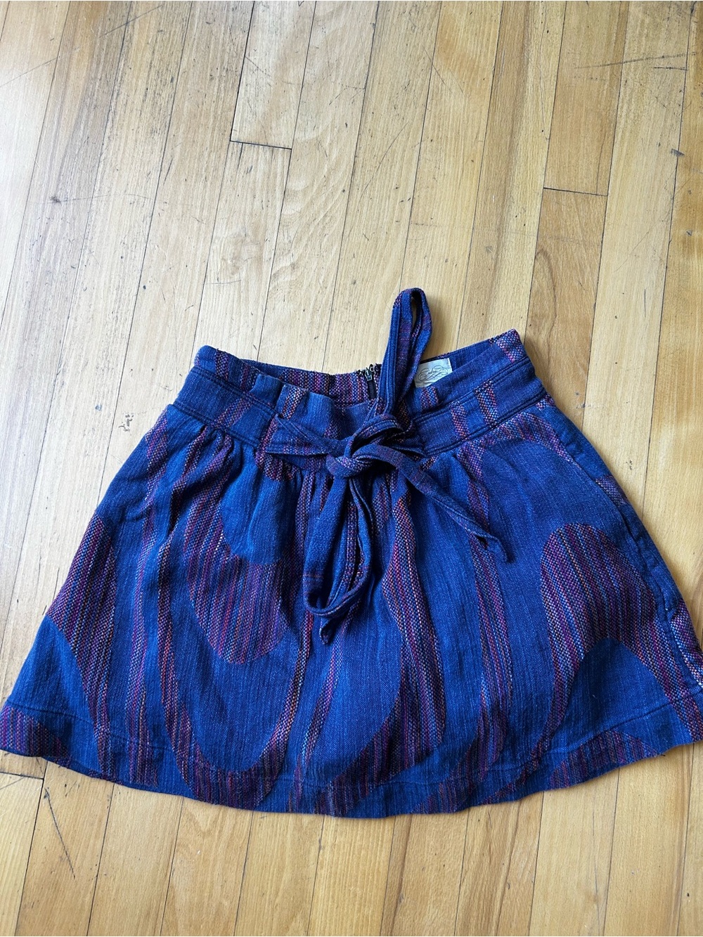 Anthropologie Blue Mini Skirt with Tie Waist and Subtle Purple Accents